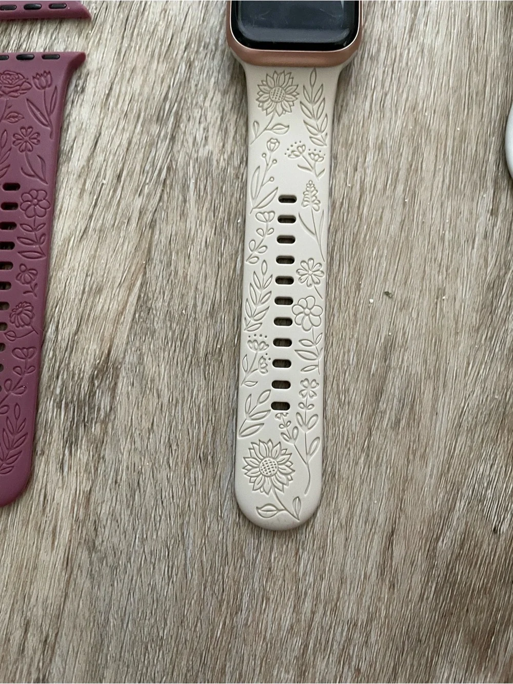 Apple Smartwatch with White, Black, and Mauve Bands